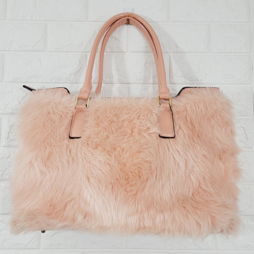 Blush pink fuzzy faux fur handbag.